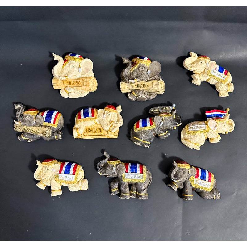 Set of Thai elephant fridge magnet souvenirs with colorful flag patterns from One-Sake.com