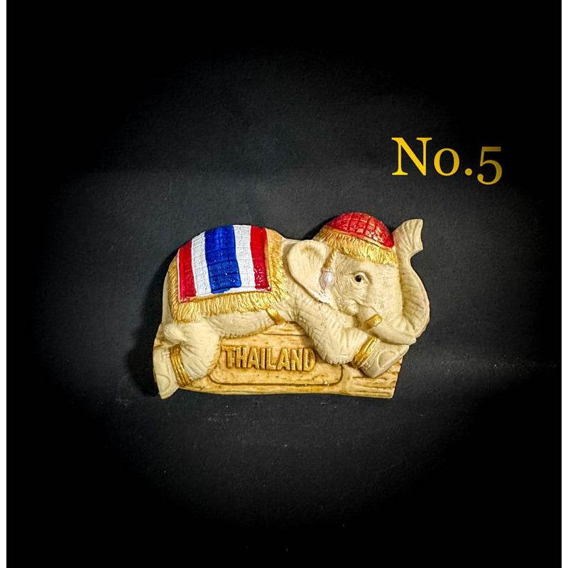 Thai elephant fridge magnet with Thailand flag colors and red hat souvenir from One-Sake.com