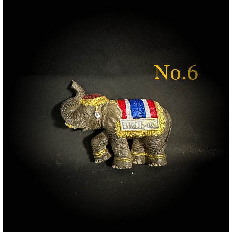 Thai elephant fridge magnet with colorful traditional cloth design and Thailand text