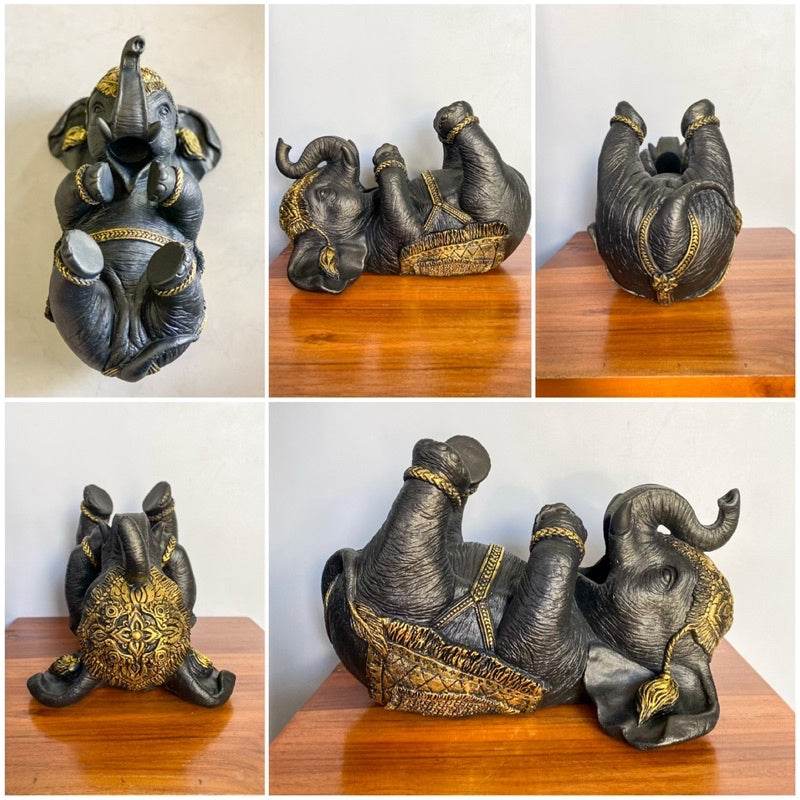 Thai elephant wine rack in black and gold detail from One-Sake.com shown from multiple angles on wooden surface