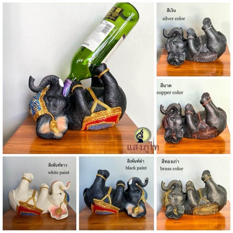 Decorative Thai elephant wine rack in multiple colors holding wine bottles on a wooden surface