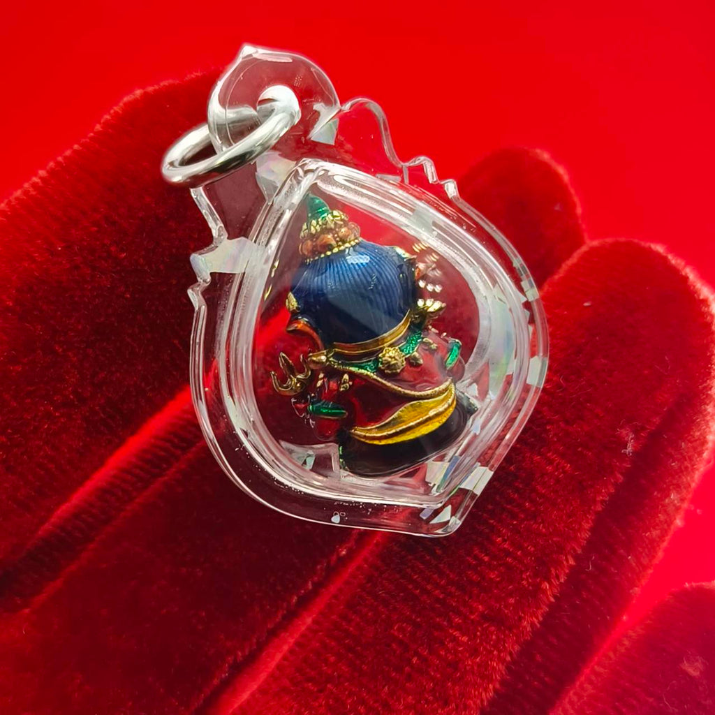 Thai Ganesha lucky charm pendant in a clear casing, perfect for bringing good fortune.