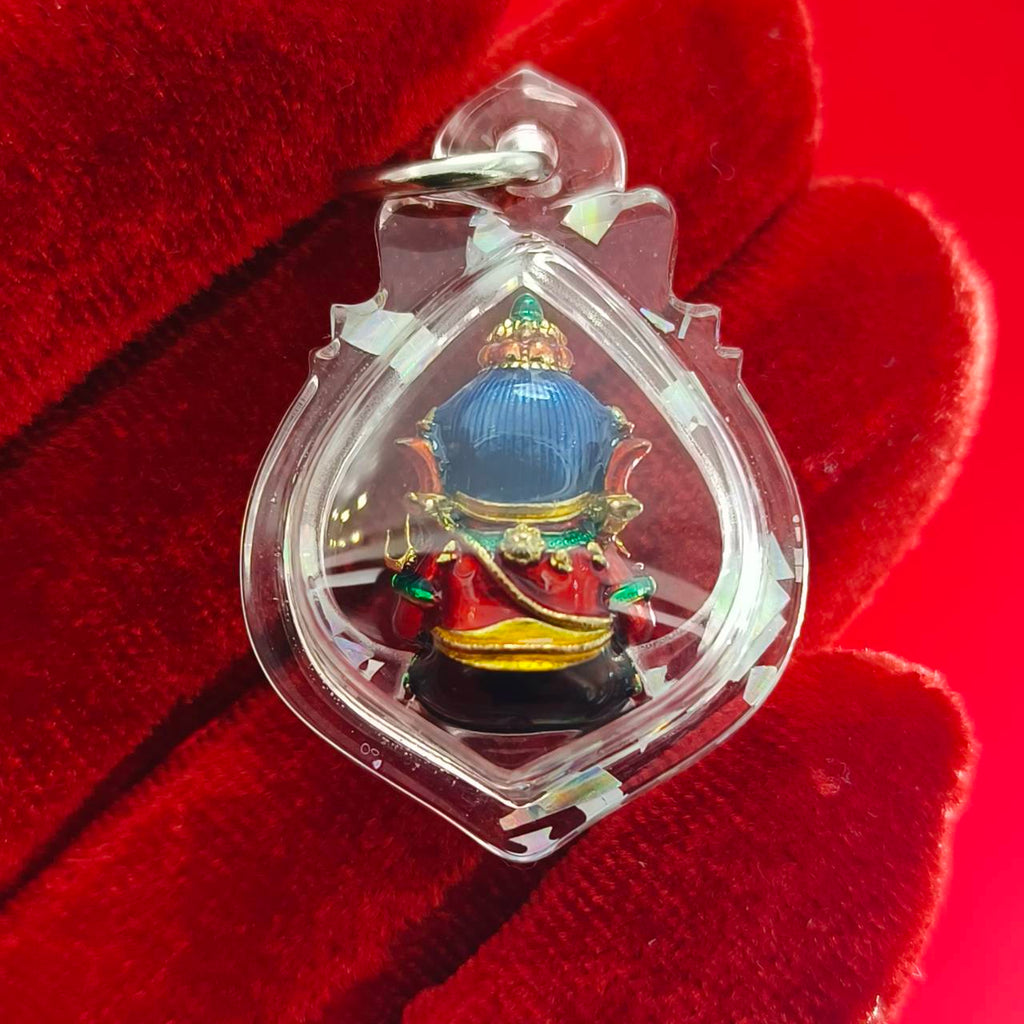 Thai Ganesha lucky charm pendant in a clear protective casing for home decor and spiritual use