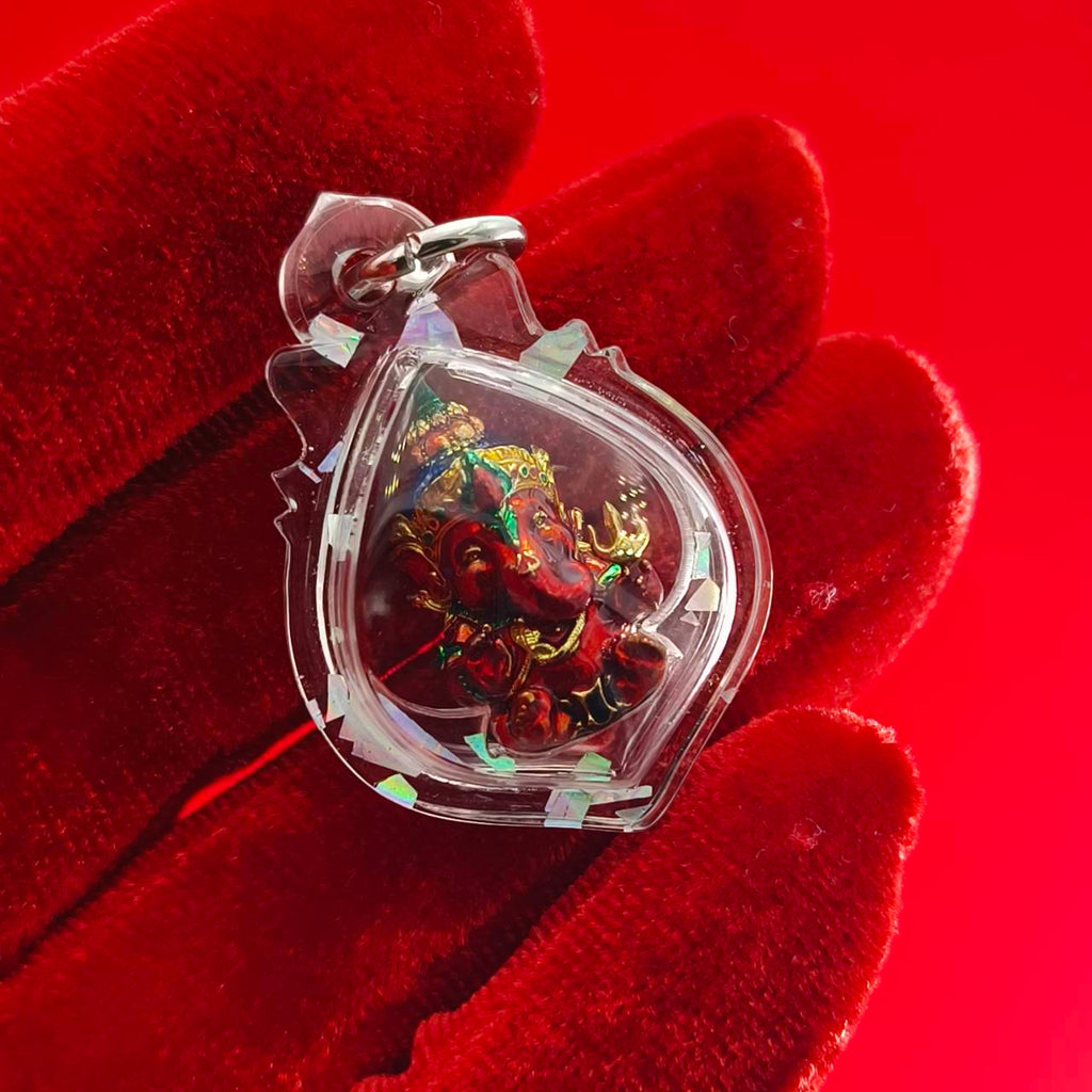 Thai Ganesha lucky charm pendant in a protective case, ideal for attracting good fortune