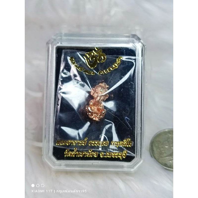 Thai ganesha miniature charm in clear plastic case by Thai Blessing Co for home and spiritual use