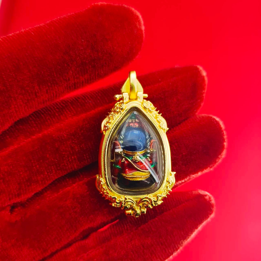 Thai Ganesha pendant for success in ornate gold setting, perfect for home decor and spiritual beliefs.