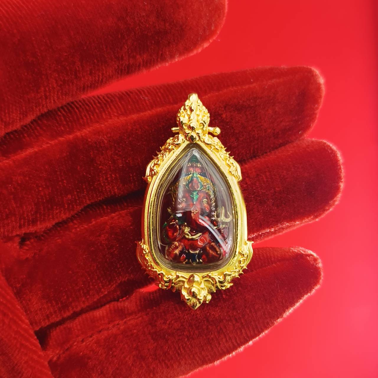 Thai Ganesha pendant for success elegantly crafted in gold with vibrant colors, symbolizing prosperity and blessings