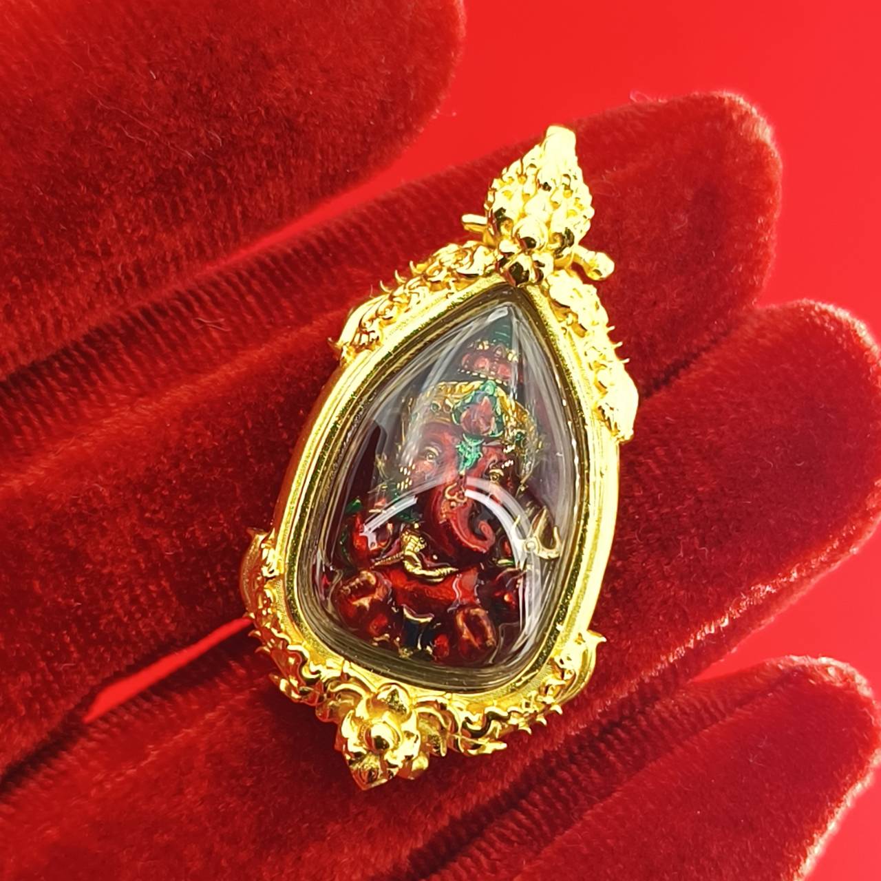 Thai Ganesha pendant for success in gold frame with vibrant details for spiritual home decoration