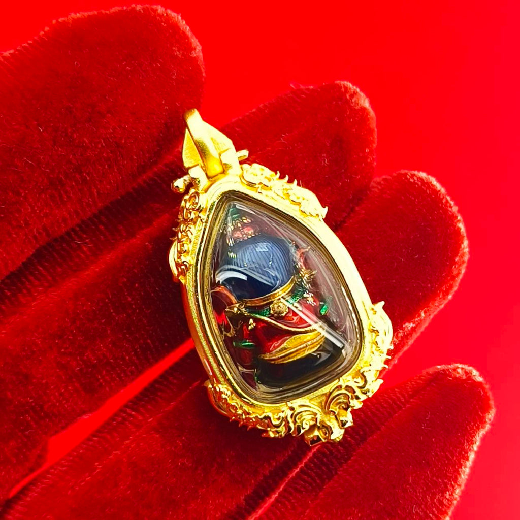 Thai Ganesha pendant for success in intricate gold setting, symbolizing prosperity and good fortune