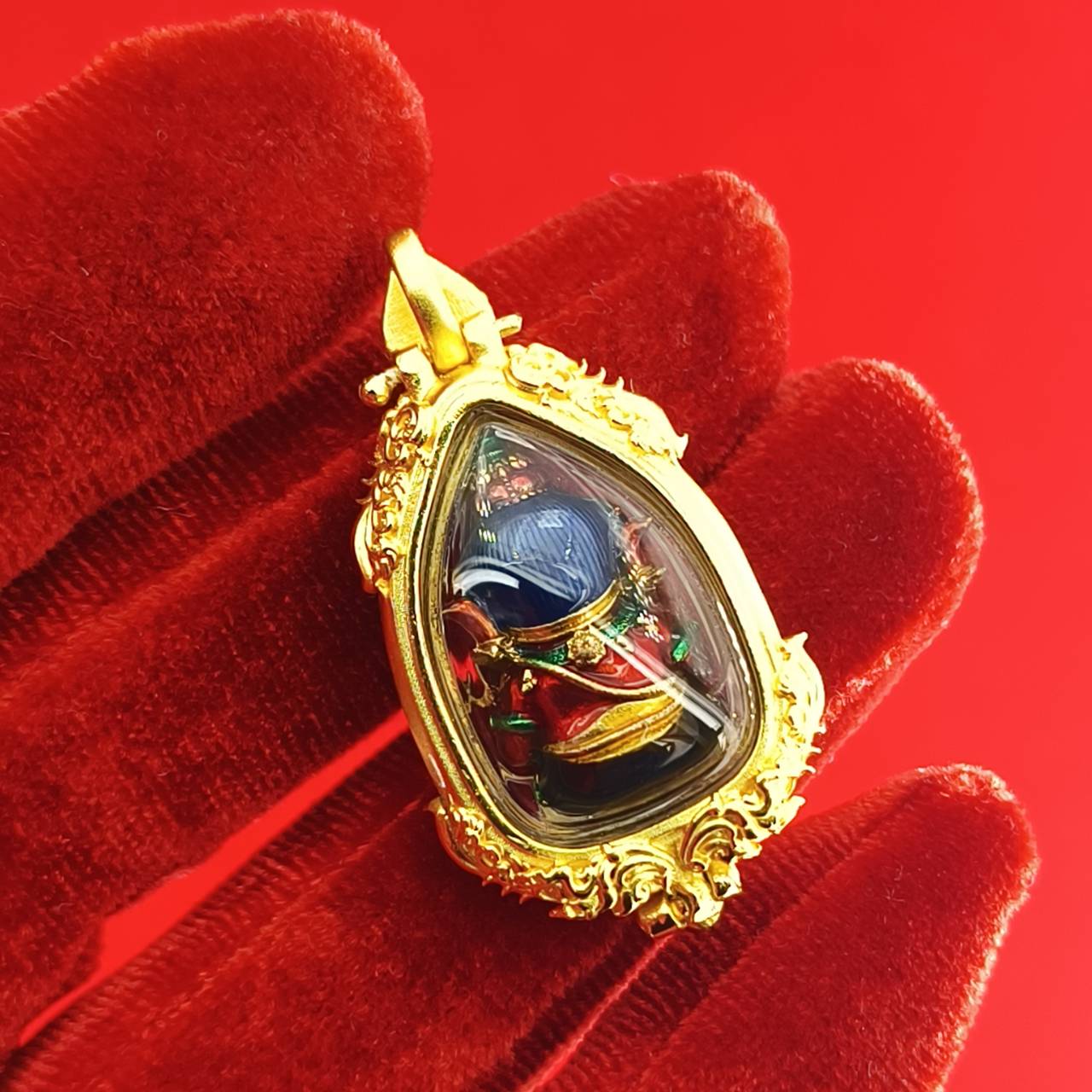 Thai Ganesha pendant for success in intricate gold setting, symbolizing prosperity and good fortune