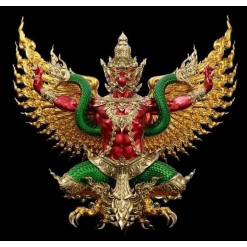 Thai Garuda lucky charm with intricate gold wings and green serpent details on a red body