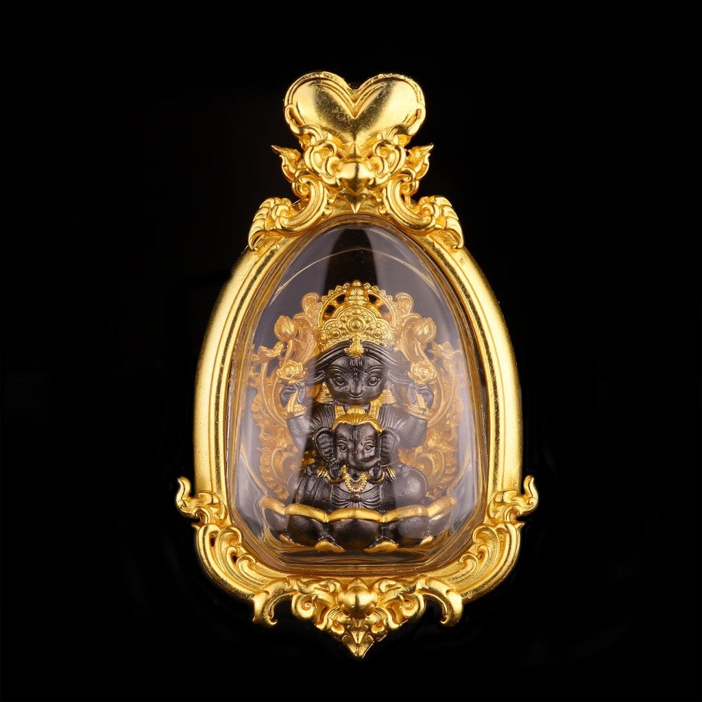 Thai goddess amulet for prosperity in ornate gold frame, featuring detailed figure for wealth attraction