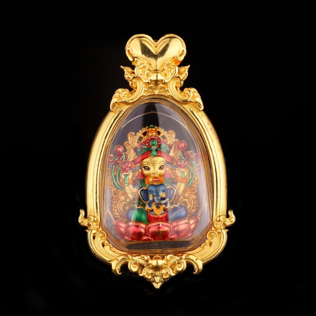 Thai goddess amulet for prosperity in a decorative gold frame with detailed craftsmanship