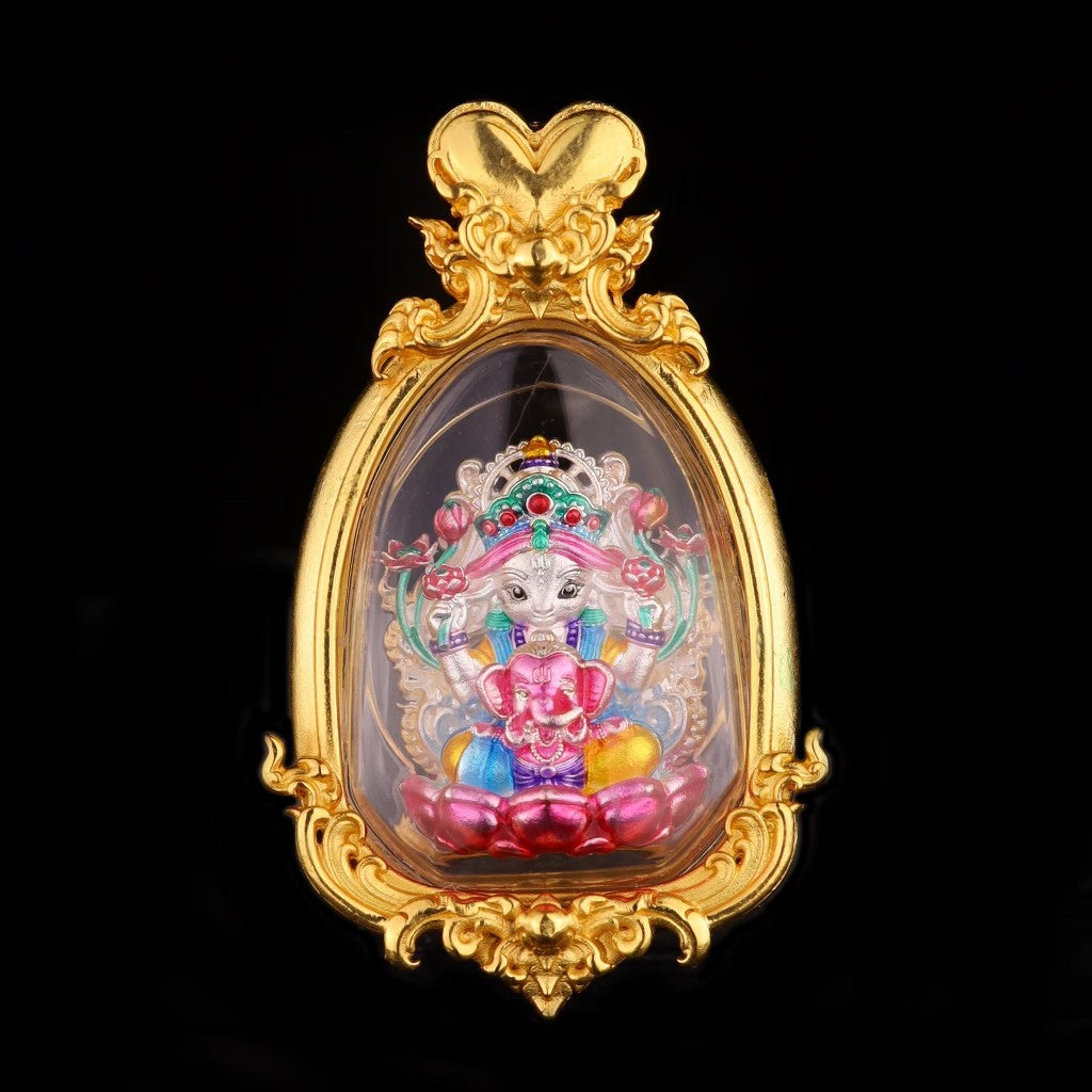 Thai goddess amulet for prosperity encased in ornate gold frame featuring vibrant colors and detailed design