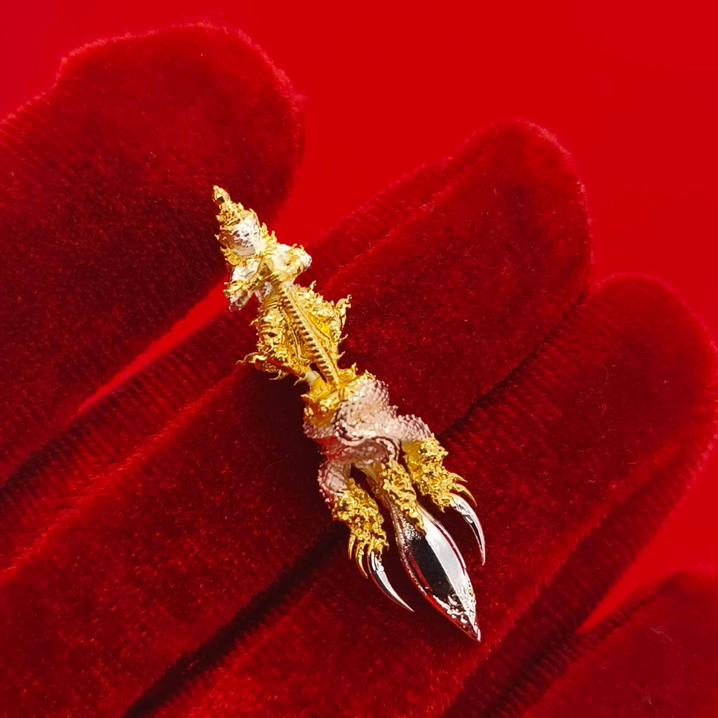 Thai guardian amulet Klang Setthi edition featuring intricate design and detailed craftsmanship in gold and silver
