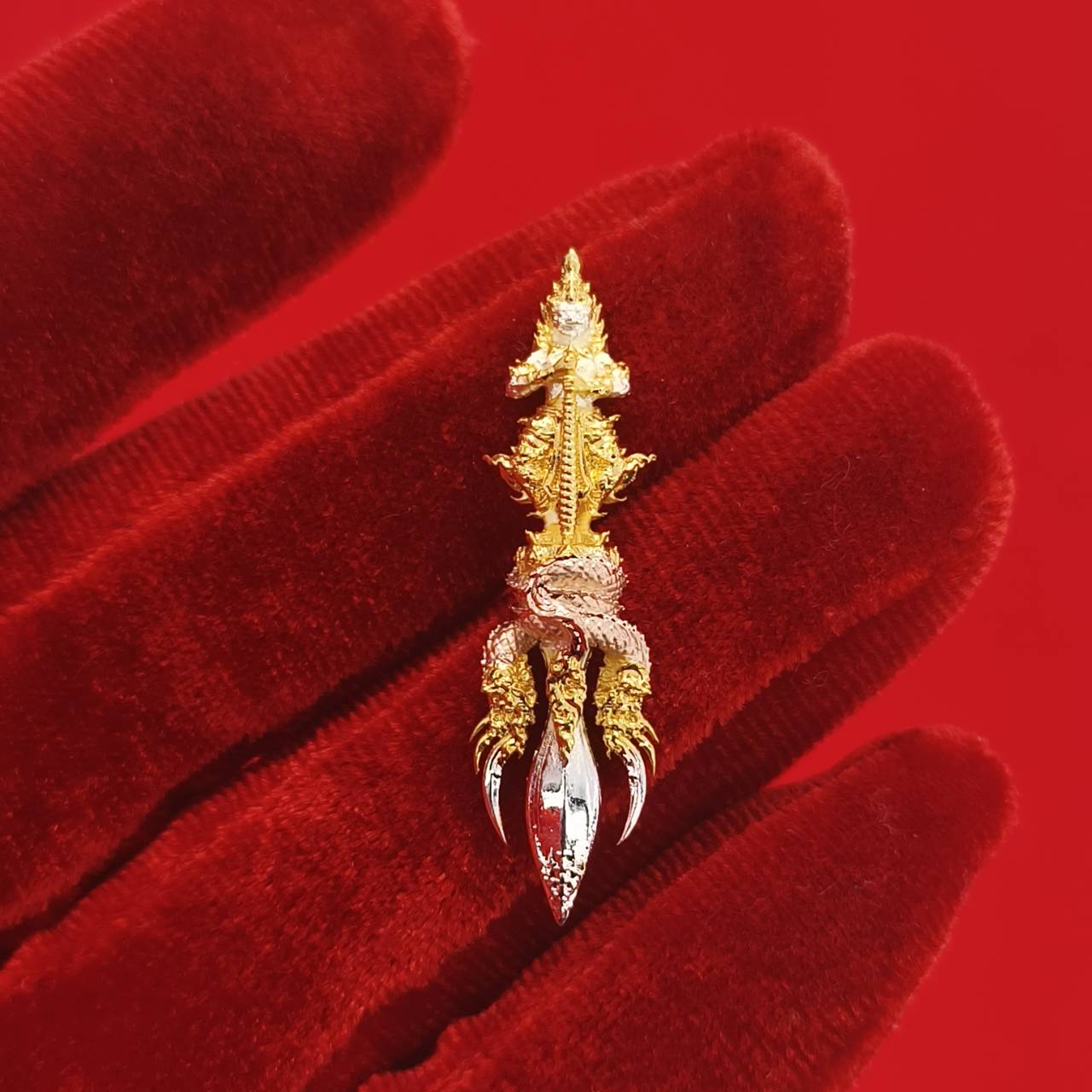 Thai guardian amulet Klang Setthi edition featuring intricate design and gold accents for spiritual protection
