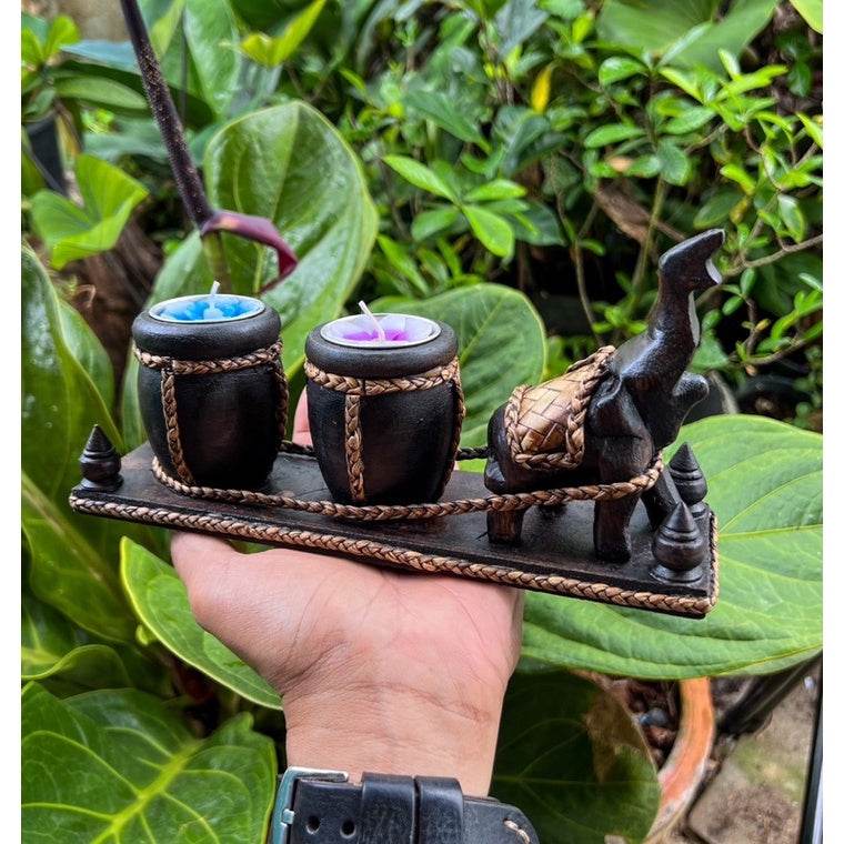 Handheld Thai handcrafted home decor candle holder featuring elephant and woven design