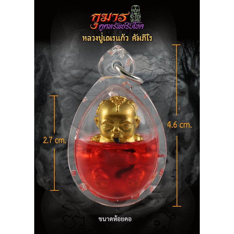 Thai Kuman Thong wealth charm in a protective casing for prosperity and good fortune
