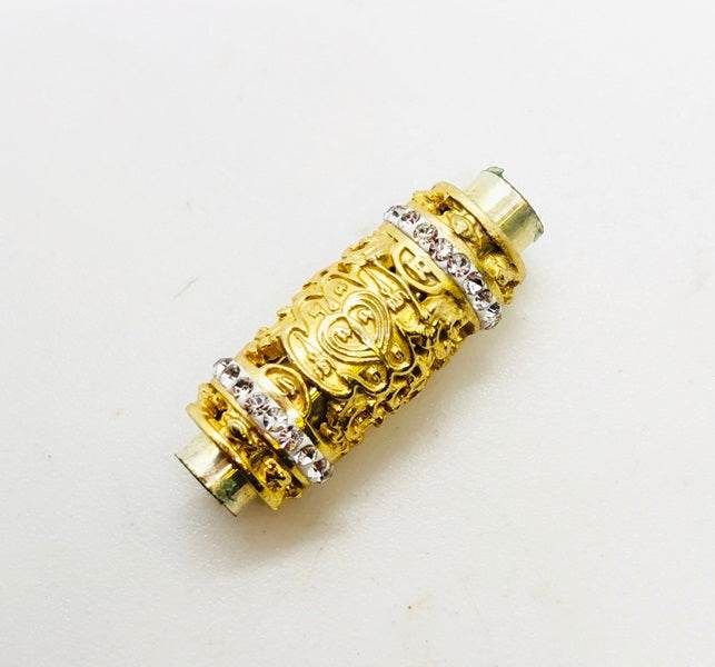 Thai love and luck amulet Nang Riek hand-scribed talisman in gold with intricate designs and sparkling accents