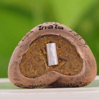 Thai lucky charm for prosperity with natural wood and sacred inscriptions by Thai Blessing Co