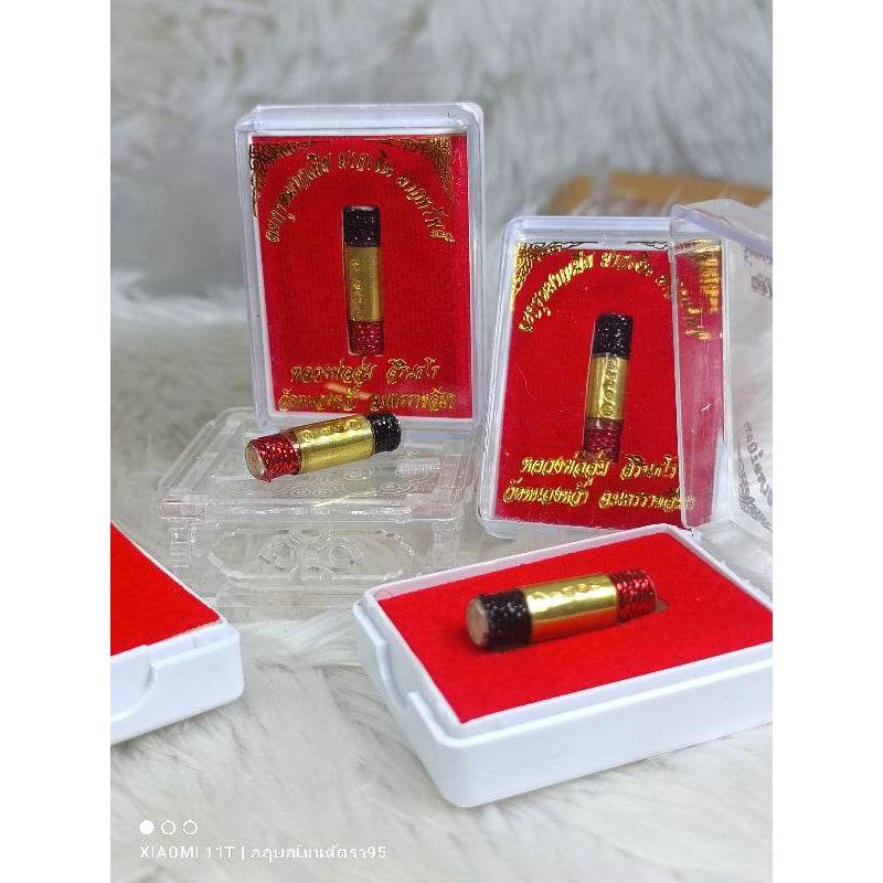 Thai lucky charm many wives in gold and red casing displayed in clear plastic boxes by Thai Blessing Co