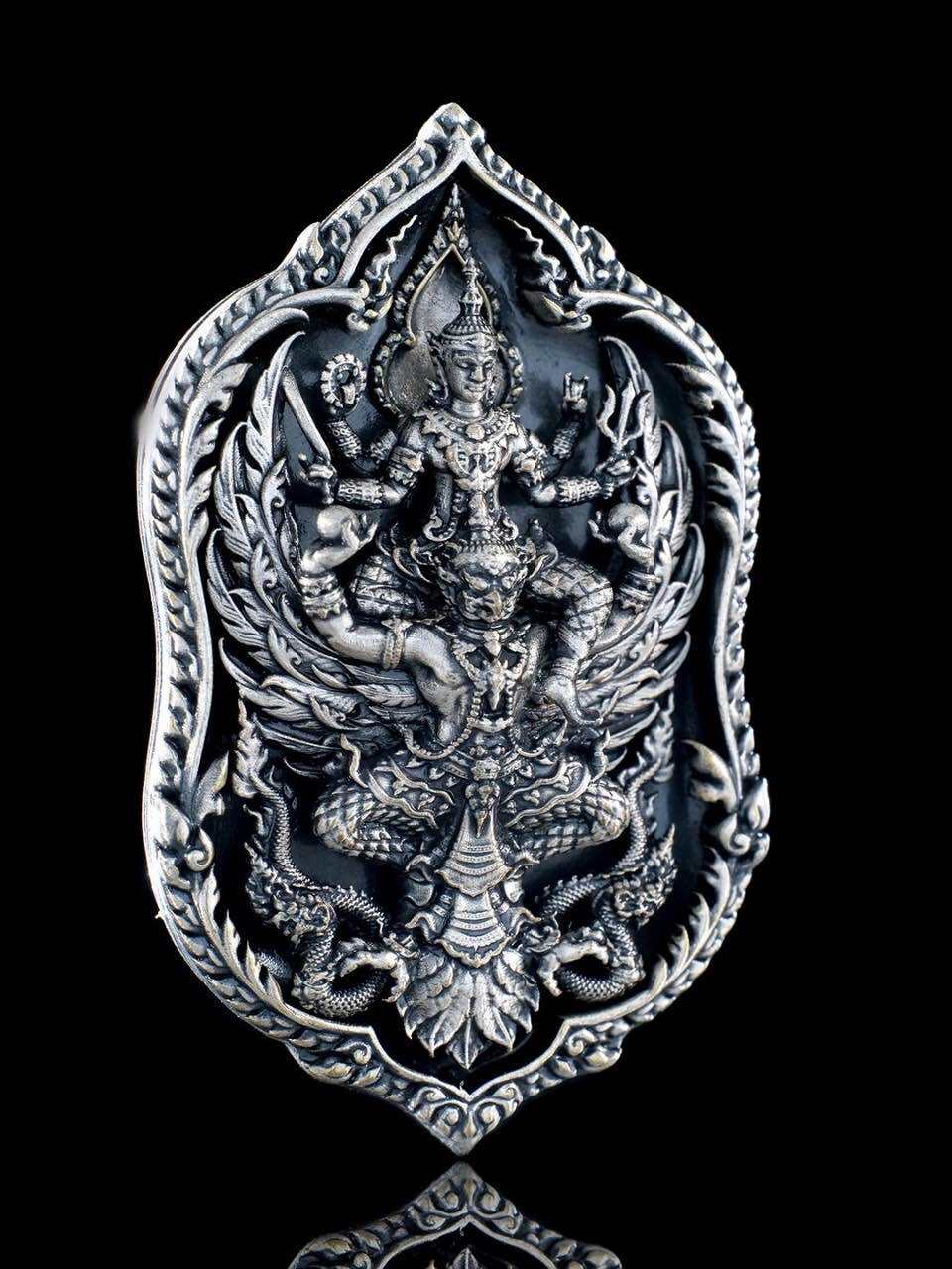 Elegant Thai lucky coin for wealth and protection featuring intricate deity design and vibrant details