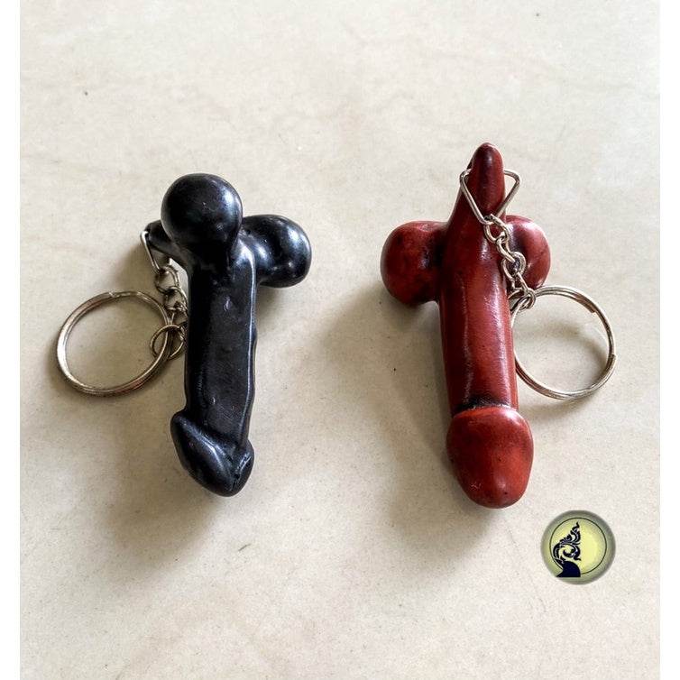 Two Thai lucky keychain in black and red colors with metal rings for carrying keys