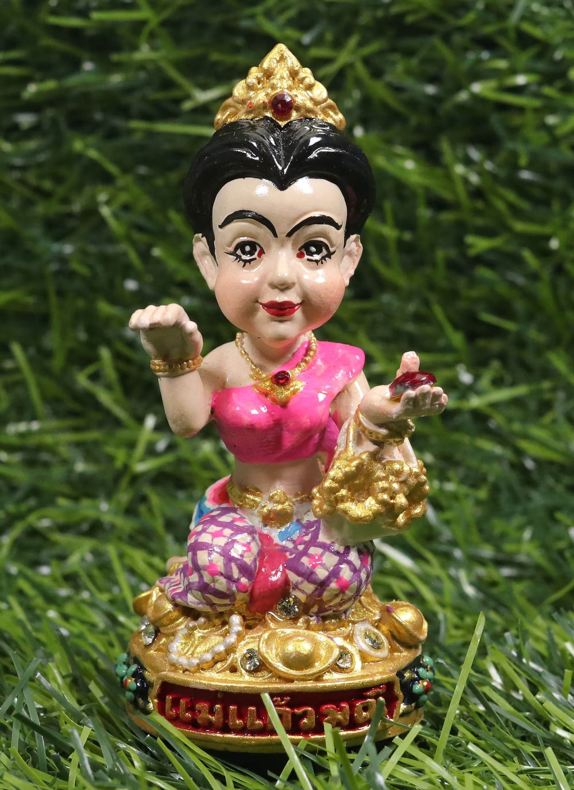 Thai prosperity figurine for shop decor by Thai Blessing Co featuring traditional attire and gold accents