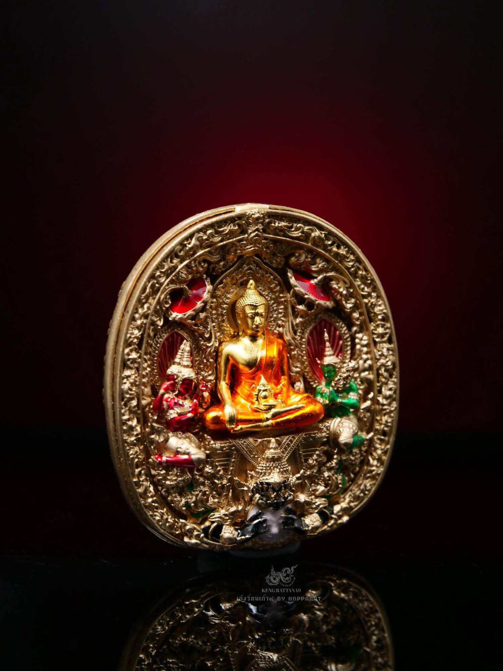 Thai protection amulet double consecration Phra Yod Khun Phon Amulet with intricate gold detailing and colored accents