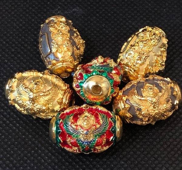 Unique Thai protection amulet for prosperity featuring intricate gold and colorful designs
