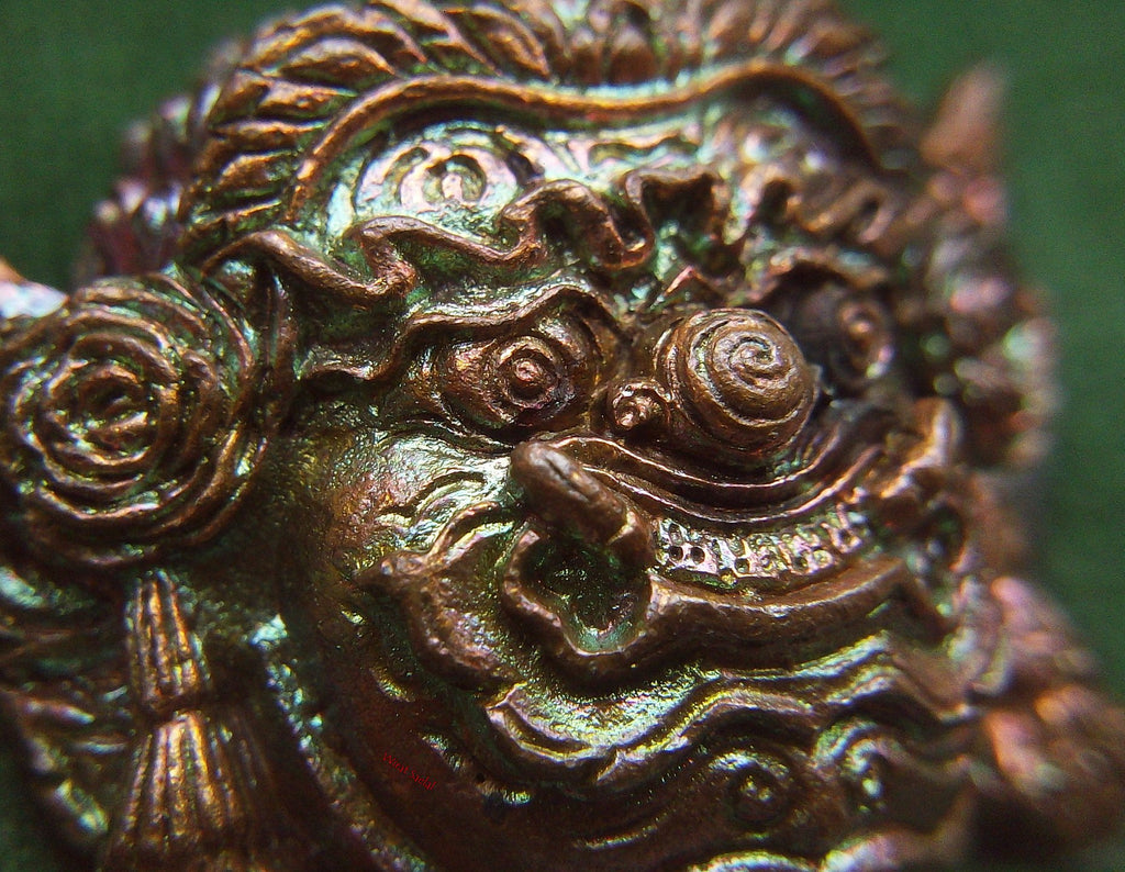 Detailed Close-Up of Thai Protection Amulet Rahu with Intricate Design and Bronze Finish