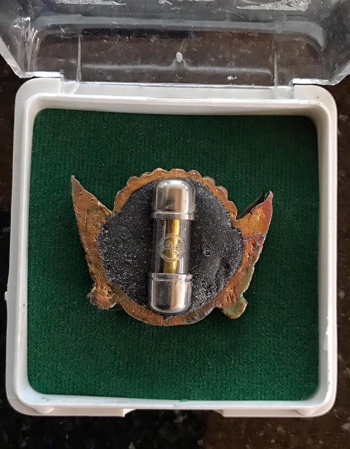 Thai protection amulet Rahu in decorative case for spiritual and protective benefits