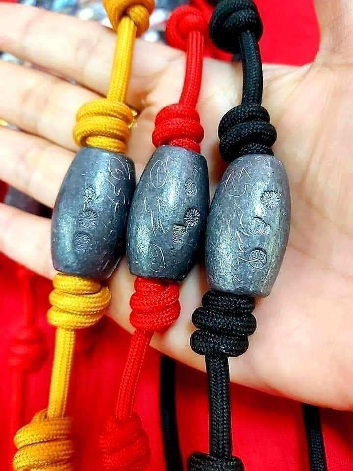 Luk Sakot Suea Non Kin Talisman by Lp Poon - Authentic Thai Protection and Prosperity Amulet Default Title