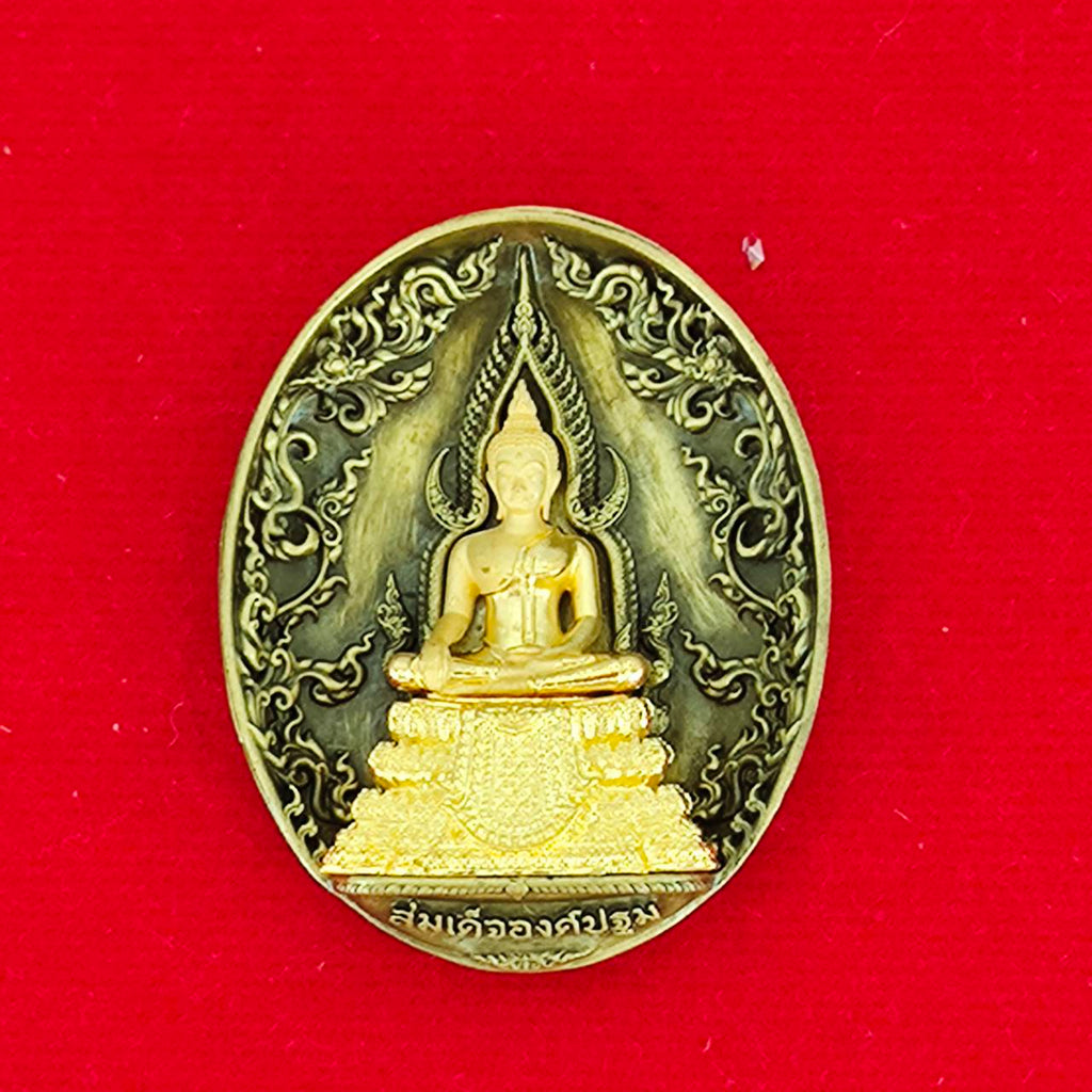 Thai protection fortune blessing charm featuring a detailed Buddha design on a red background