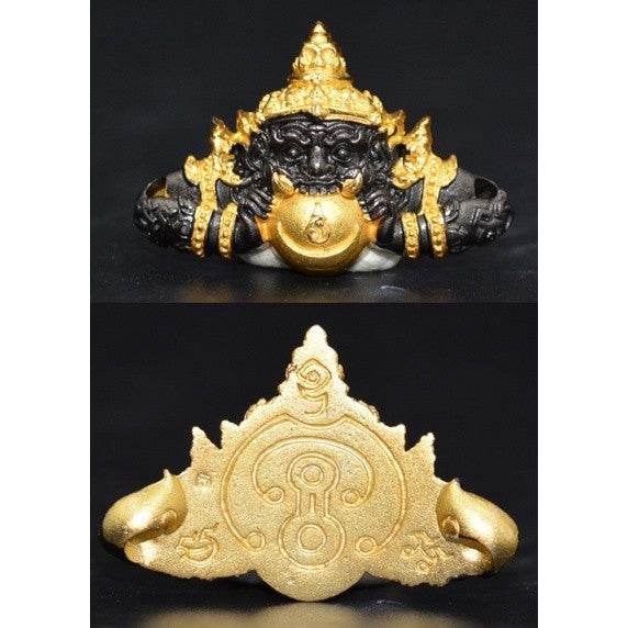 Thai Rahu amulet for prosperity featuring intricate gold and black design for spiritual protection