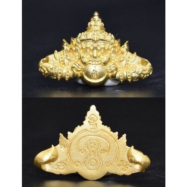 Thai Rahu amulet for prosperity in gold, featuring intricate deity design for spiritual benefits
