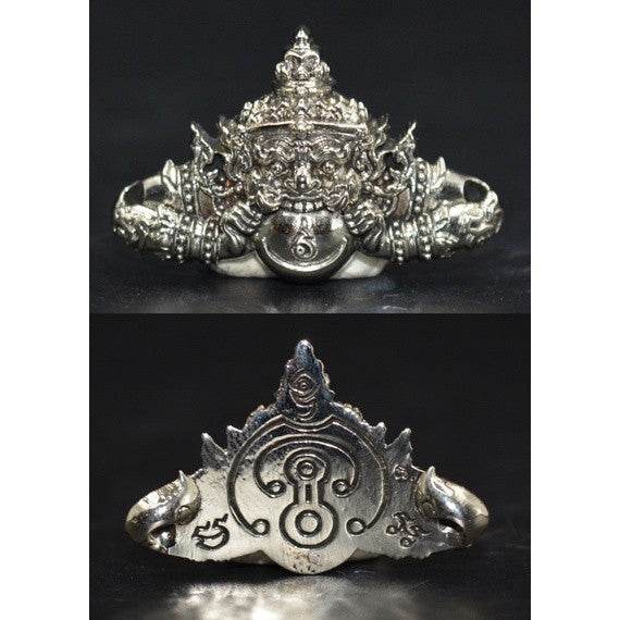 Intricate Thai Rahu amulet for prosperity featuring detailed carvings and sacred symbols