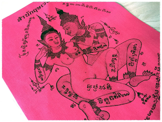 Thai sacred cloth for attraction featuring traditional designs and motifs in vibrant pink color