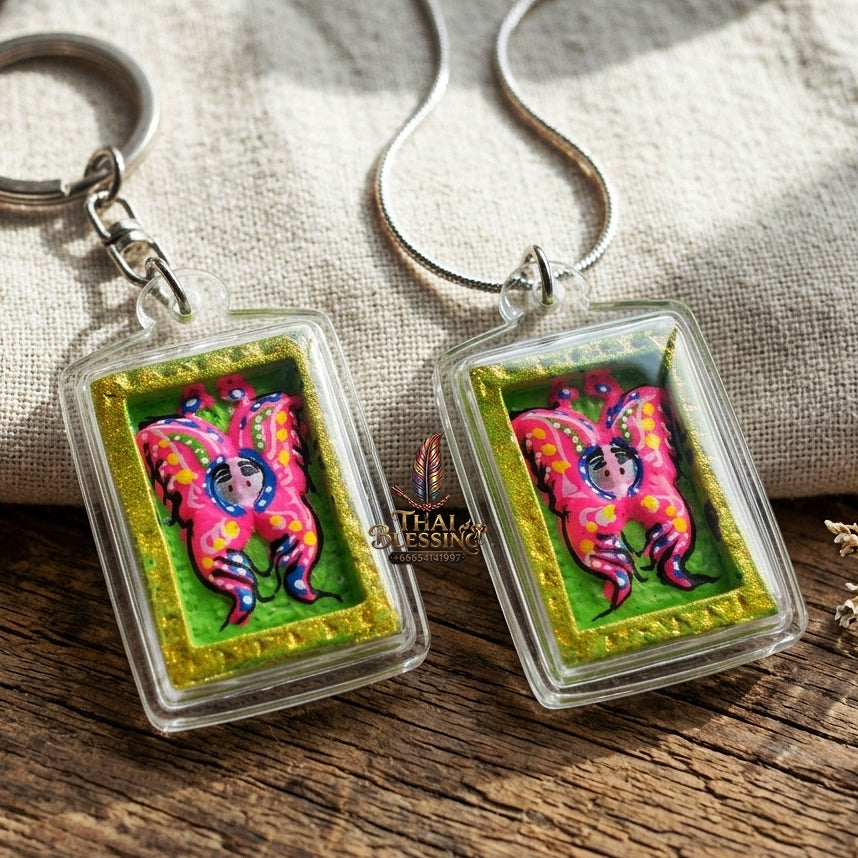 Authentic Thai Mini Butterfly King Amulet "Thep Chamlaeng Pamorn Vibrant Pink & Green Hand-Painted Pendant" Consecrated by Khru Ba Krissana, Samnak Song Weruwan, Nakhon Ratchasima B.E. 2562 (2019)