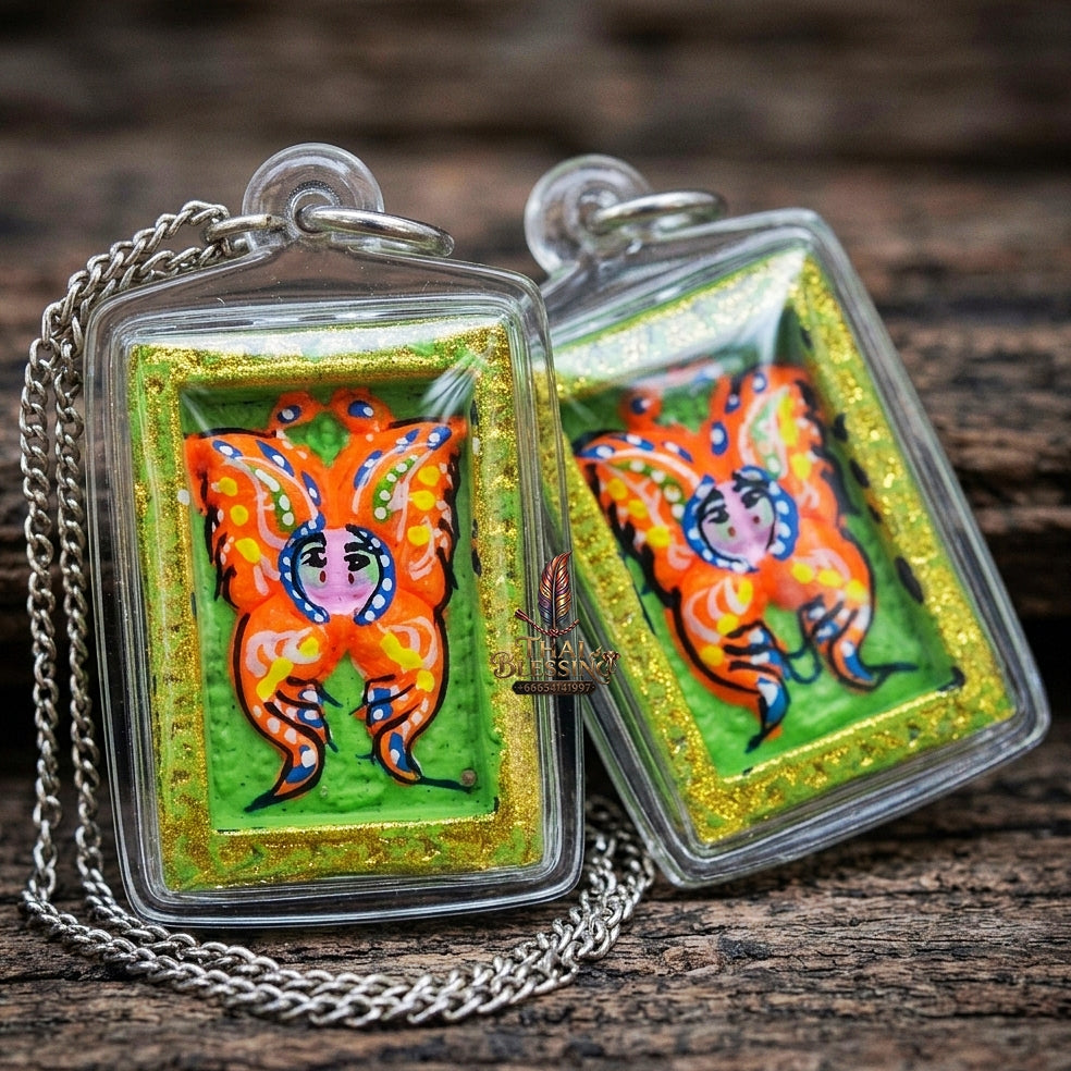 Authentic Thai Mini Butterfly King Amulet "Thep Chamlaeng Pamorn Vibrant Orange Butterfly on Green Background Hand-Painted Pendant" Consecrated by Khru Ba Krissana, Samnak Song Weruwan, Nakhon Ratchasima B.E. 2562 (2019)