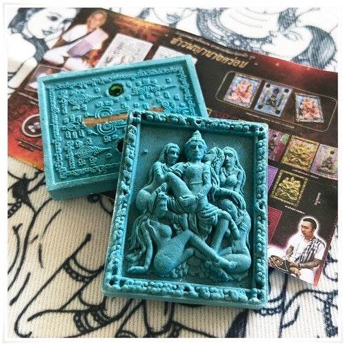 Thai seduction charm talisman with intricate design, crafted by Thai Blessing Co for spiritual enhancement
