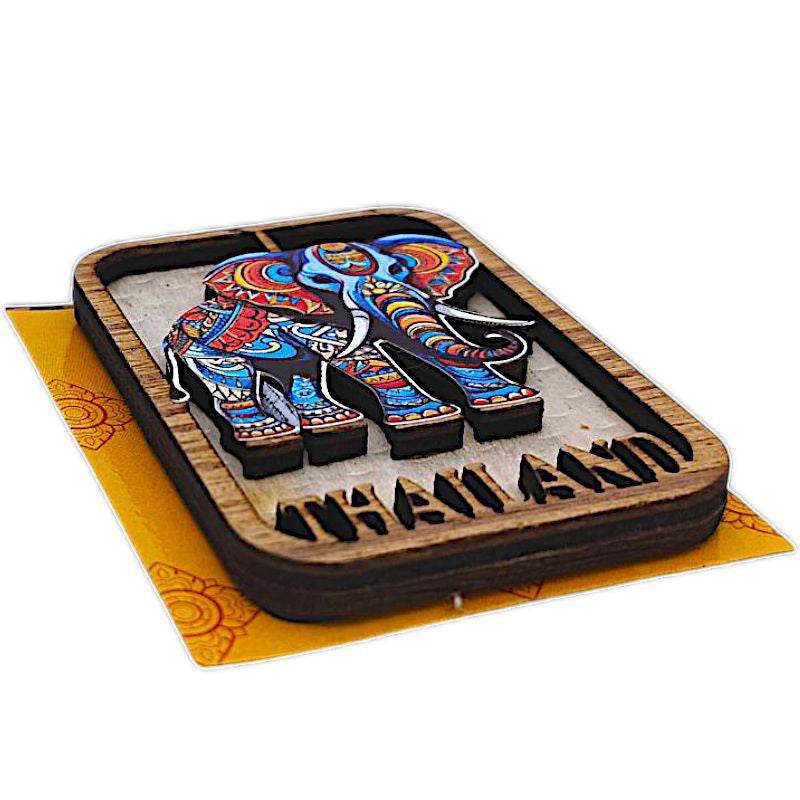 Colorful elephant wooden Thailand souvenir magnets with intricate patterns and Thailand text
