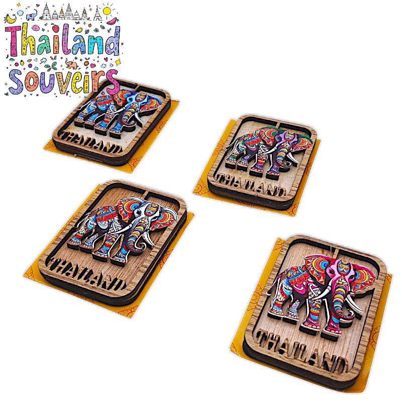 Colorful elephant design Thailand souvenir magnets from One-Sake.com with wooden base and intricate patterns
