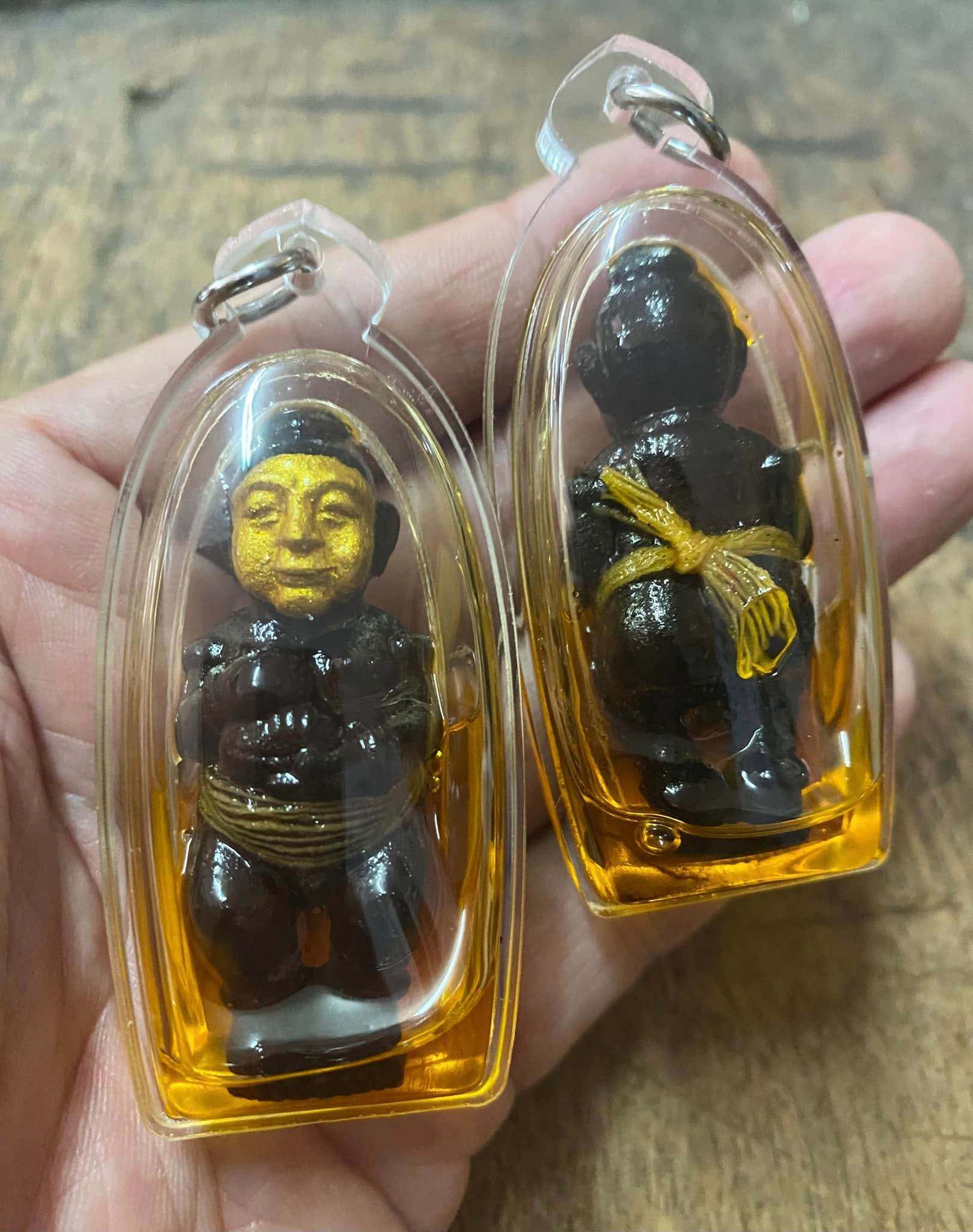 Thai Spirit Doll for Wealth and Protection Encased in Clear Plastic with Traditional Details