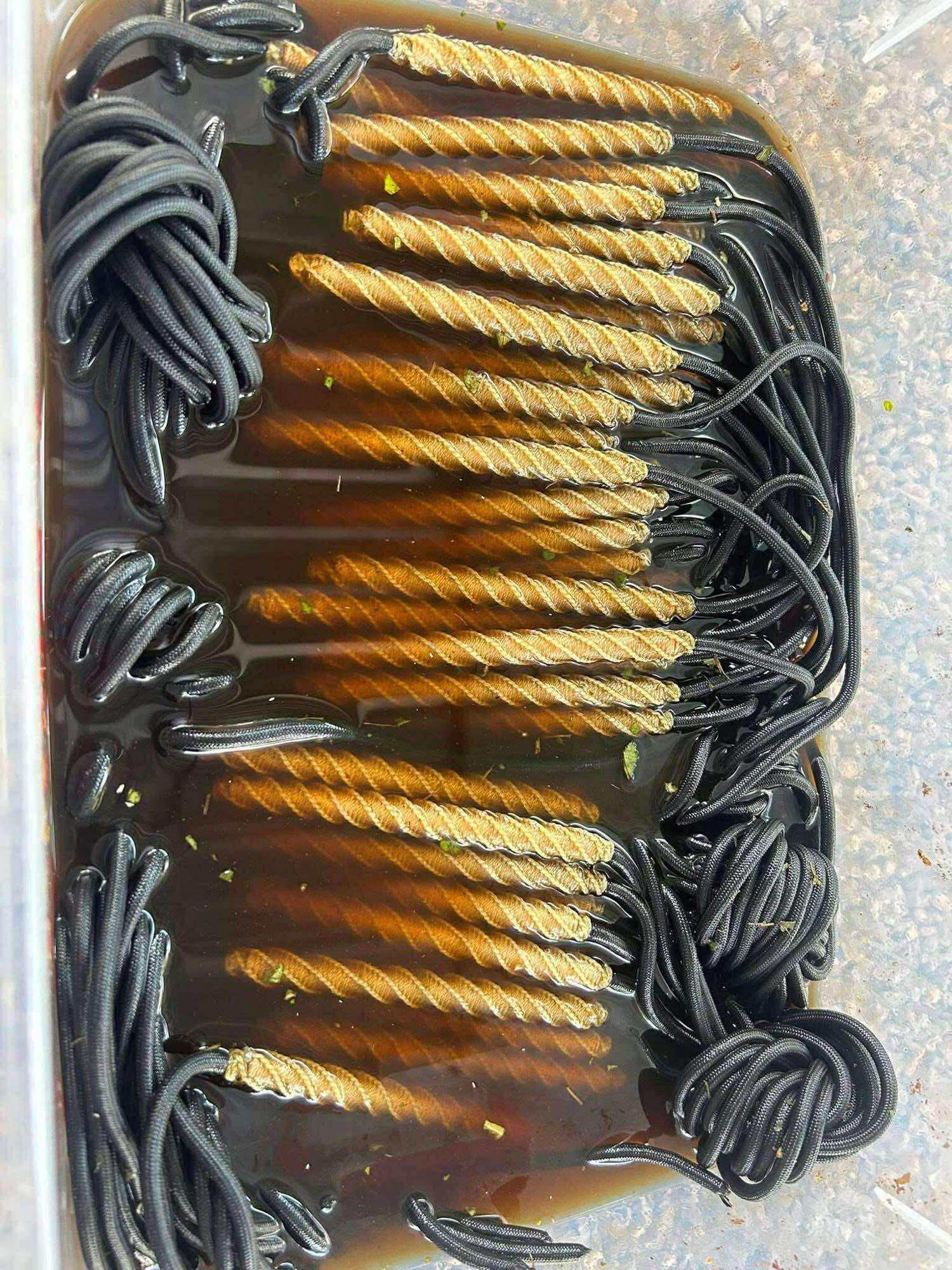 Thai Blessing Co Takrud waist amulet for protection set of gold twisted tubes on black cords