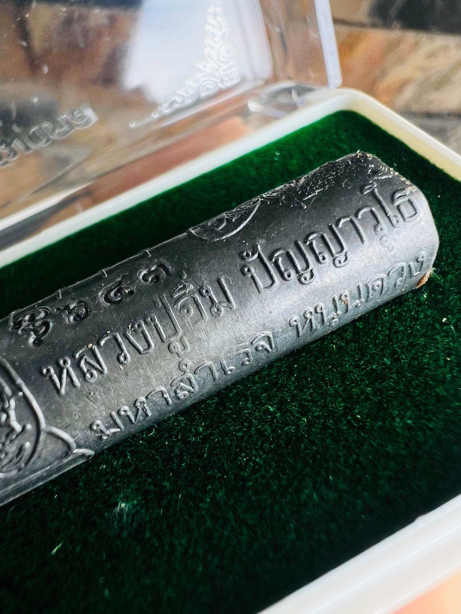 Takrut Solos Mongkol amulet silver engraved cylinder with Thai script in green felt display case by Thai Blessing Co