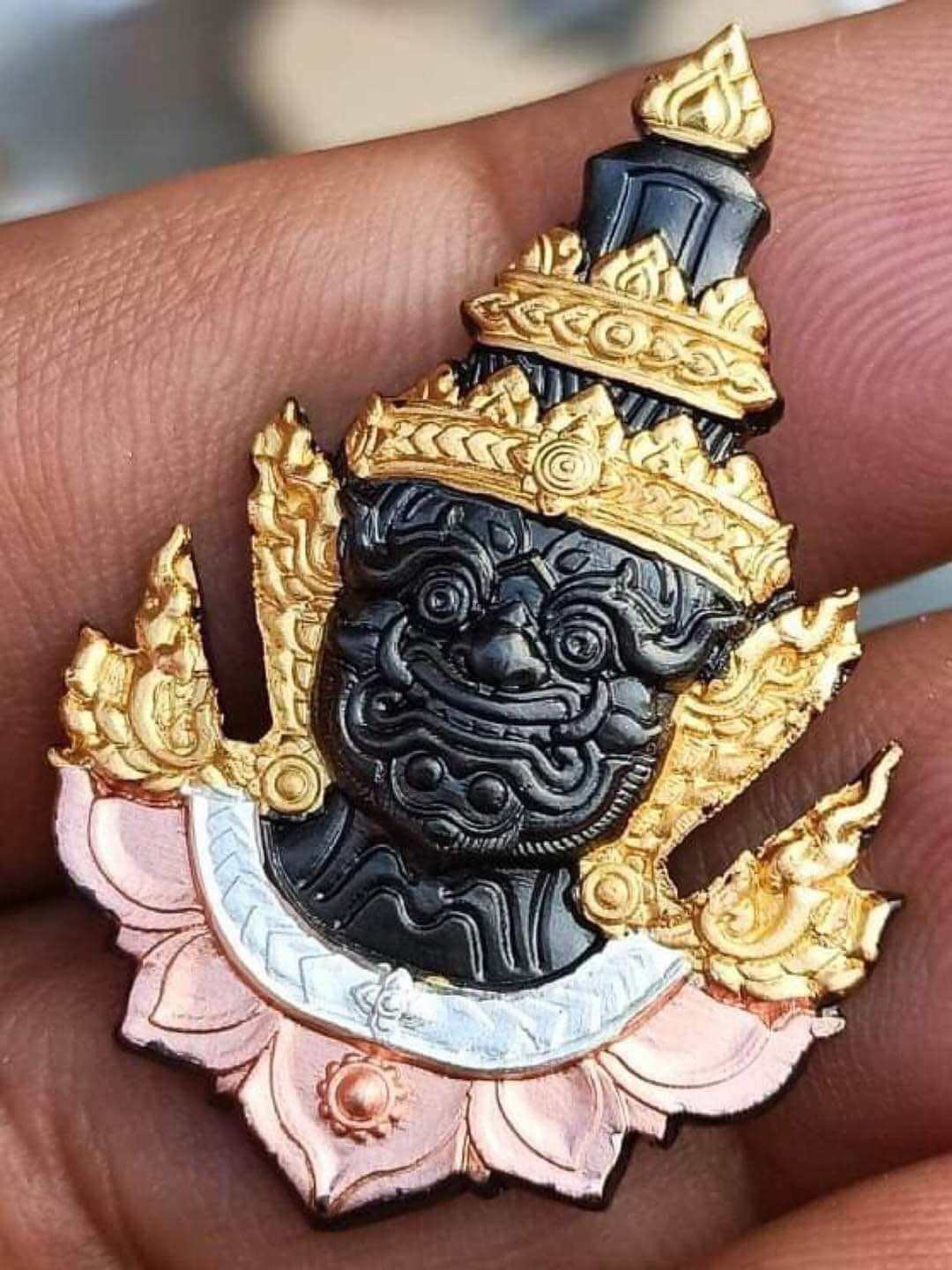 Thai Tao Wessuwan amulet with intricate details and gold accents, symbolizing protection and good fortune