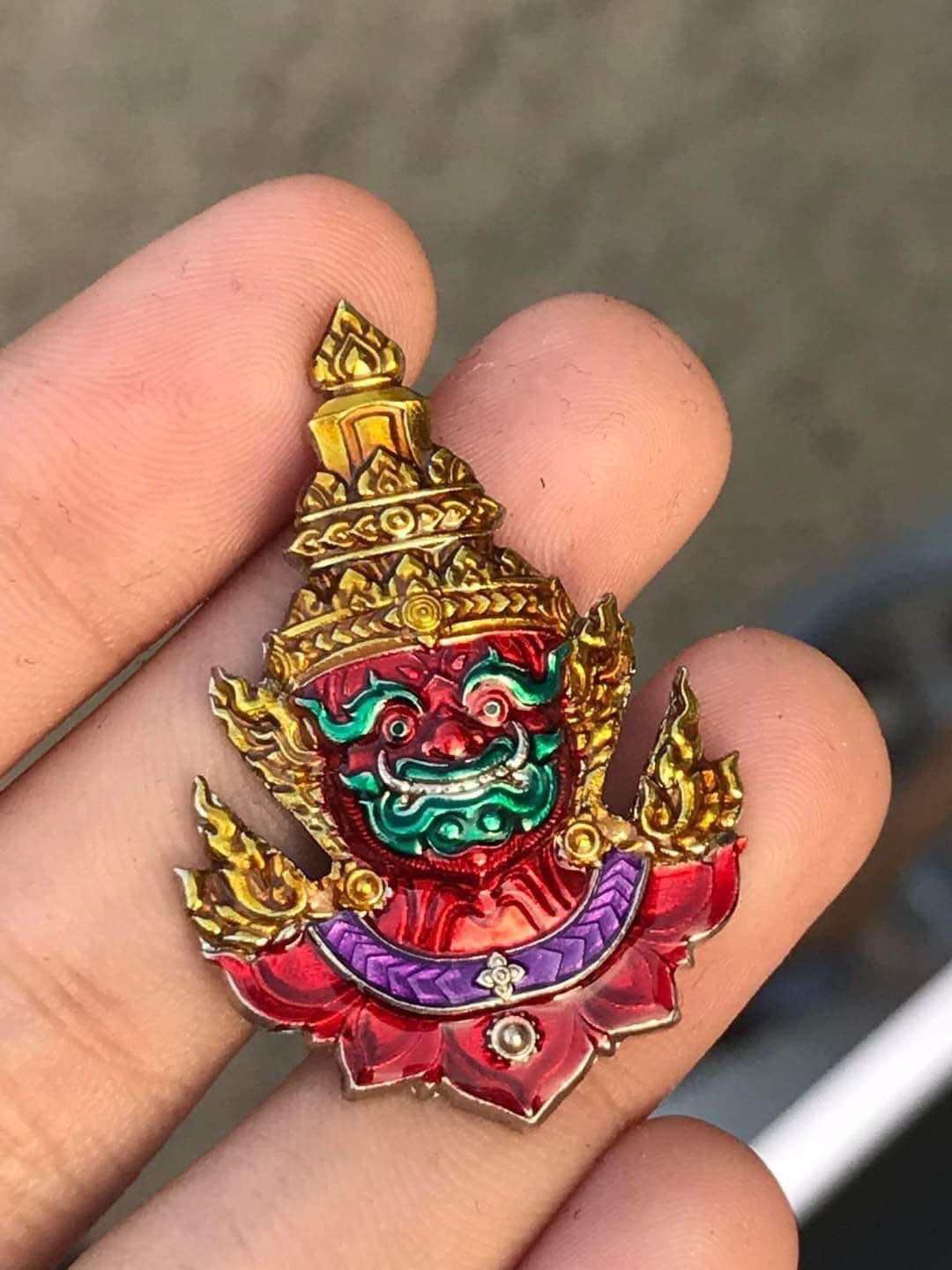 Thai Tao Wessuwan amulet in vibrant colors featuring intricate details and spiritual significance