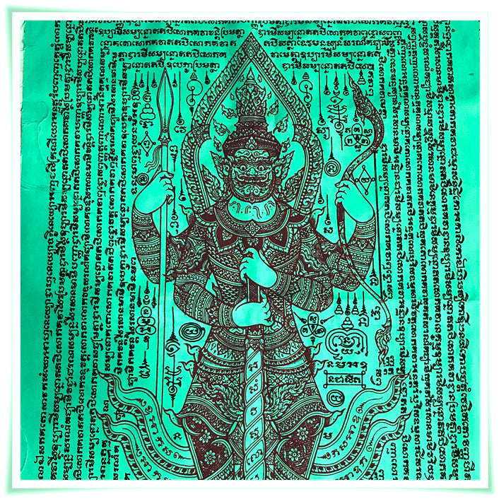 Green Thao Wessuwan yantra cloth featuring ornate guardian deity with twin weapons and protective Thai script