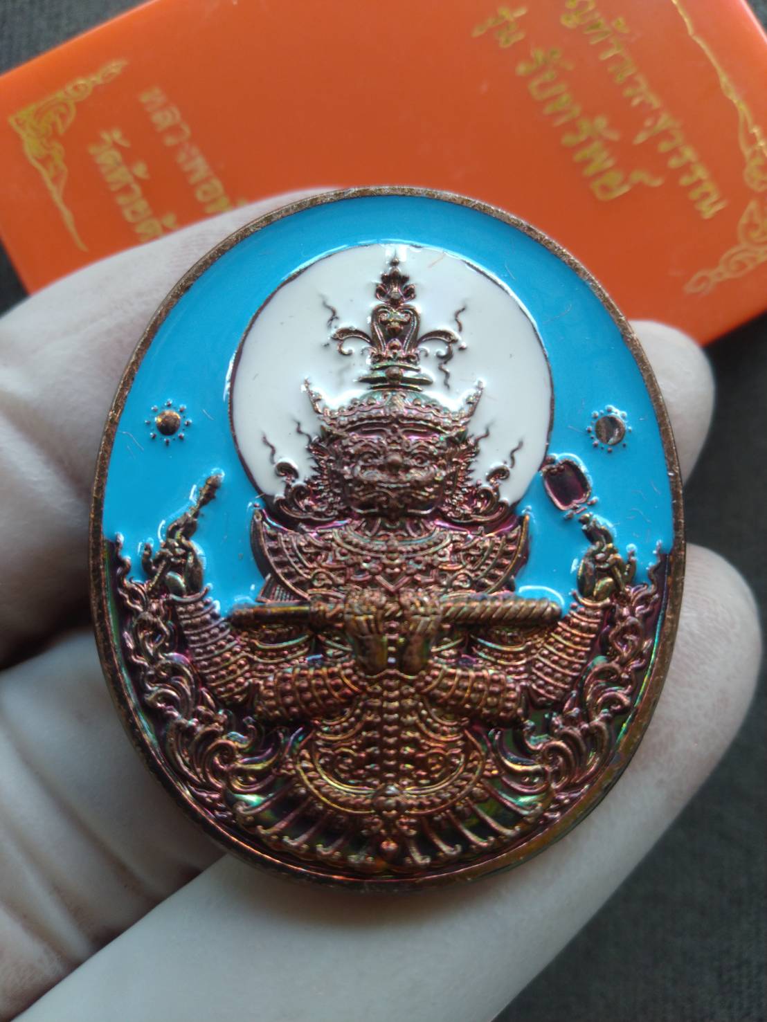 Thai Blessing Co Thao Wessuwan wealth amulet oval pendant with bronze deity relief and turquoise enamel